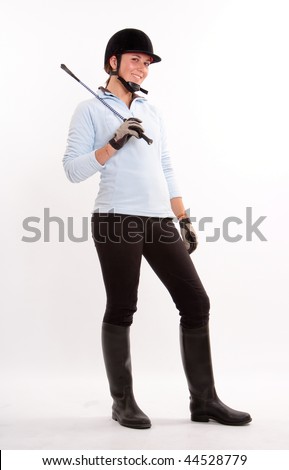 horseback riding outfit. in horse riding clothes