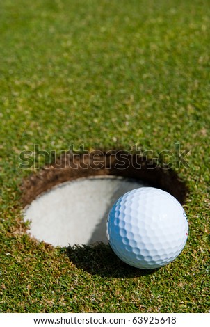 Golf ball close to the hole