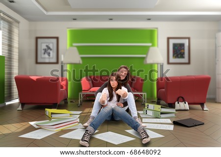 Mother and daughter pretending to drive in their living room