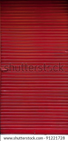 Closed red Shop shutters ideal for backgrounds
