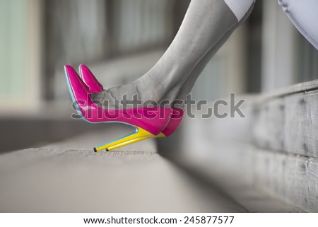 Concept close up image of woman sitting in Elegant sexy pink high heel shoes, relaxed on bench, copy space, blurred background, filtered.