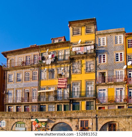 facadesof thin typical houses in old town, Porto, Portugal