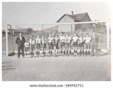 POLAND, WARSAW - CIRCA 1910s: old photo of football team. Illustrative Image, subject of human interest