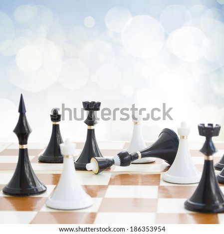 checkmate white knight  defeats black king on blue background