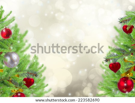 christmas frame background with decorated fir tree on gray sparkling background