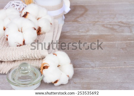 spa setting with cotton buds on gray table with copy space