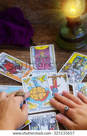 WARSAW - OCTOBER 2:  Fortunetelling with one of the most popular  occult Tarot deck dating back 1910 in  October 2, 2015, Warsaw, Poland