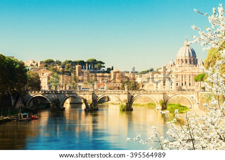 St. Peter\'s cathedral over bridge and river in Rome at spring, Italy