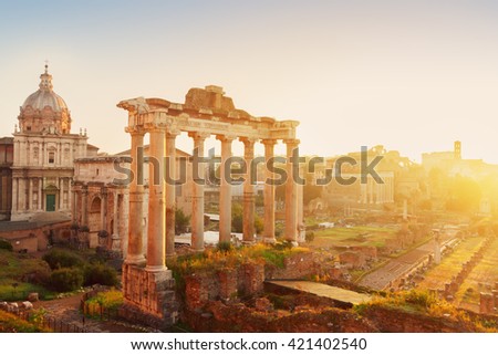 Forum - Roman ruins with cityscape of  Rome with sunrire light, Italy
