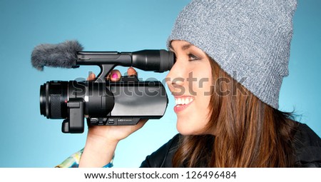 Horizontal Composition of Hip Young Adult Female Pointing Video Camera