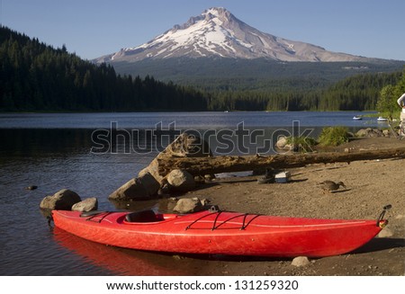 A Beautiful Recreation Area with a Single Red Kayak on Shore Trillium Lake Mount Hood Oregon
