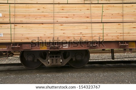 Lumber loaded on railcar for delivery railroad train transportation