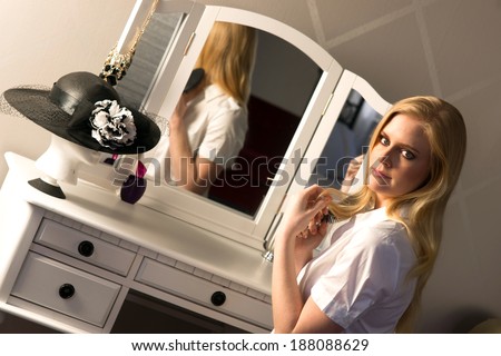 Beautiful Blonde Woman Brushing Hair Bedroom Vanity Natural Beauty