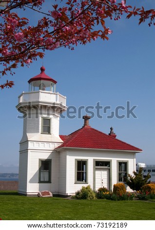 Historic Nautical Building Architecture West Coast Lighthouse Mukilteo Vertical with Apple Blossoms