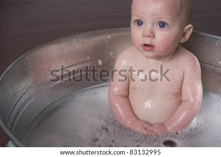 6 month old Boy bathing in a galvanized tub infant bubble bath