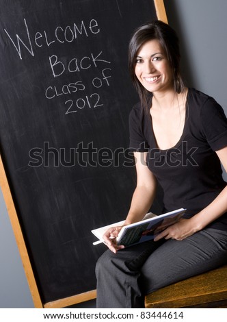 Teacher Supporting Educating Students Class Room Message on Blackboard