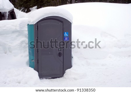 Port a Potty in a Snow Bank Portable Urinal Bathroom Sanitation Station
