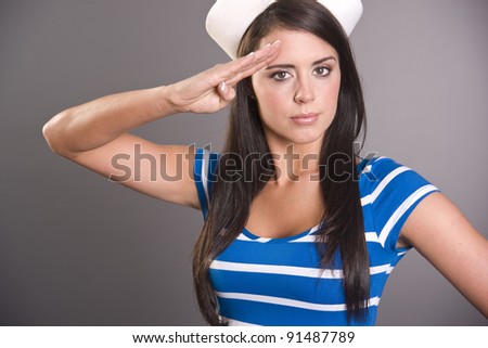 A Pretty Brunette Model Sailor Woman Salutes you