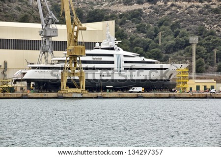 modern yacht in the yard getting ready for launch
