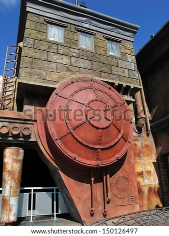 Old building with old rusty boiler