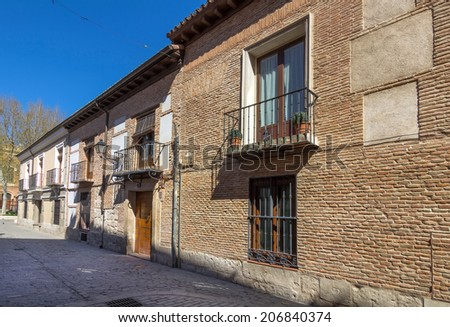 typical house in the historic town of Alcala de Henares, Spain