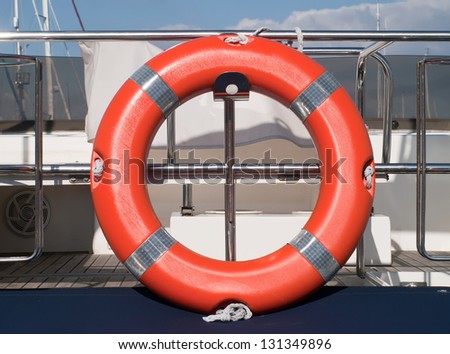 orange rescue ring on the boat