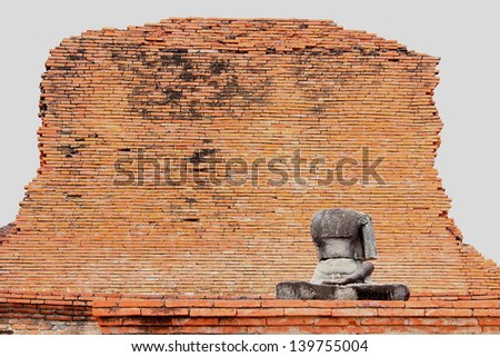 Buddha without head in front of broken bricks at historical park, Ayutthaya, thailand