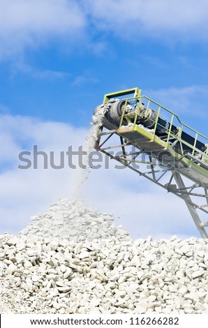 conveyor used for conveying crushed granite stone in a quarry