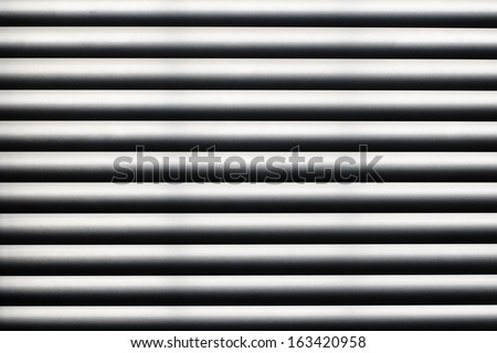 detail of the sheets of a Venetian blind closed