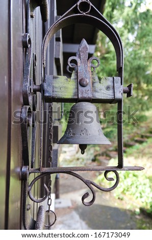 old bell used as door bell of a house