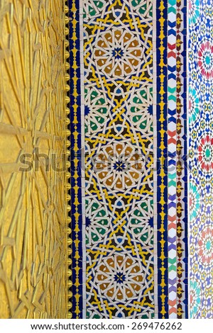 Metal work and mosaic on the gate to the palace of the king of Morocco in Fez, Morocco