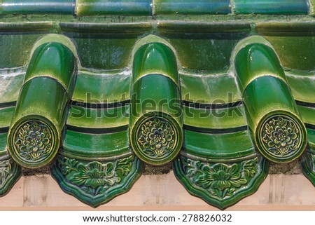 Old roof of Chinese temple with beautiful green glazed tile pattern at the Seh Tek Tong Cheah Kongsi temple in Georgetown, Penang, Malaysia