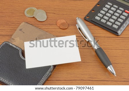 Blank name card with card holder on office table
