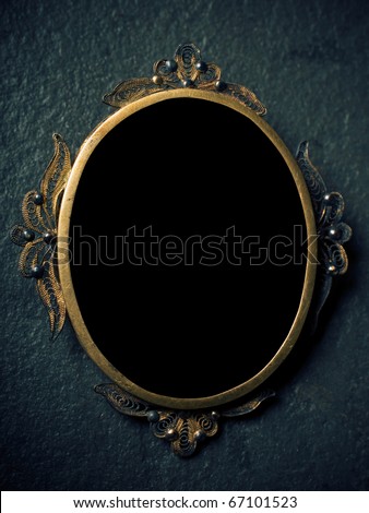 vintage oval frame on dark background. Clipping path to add your image
