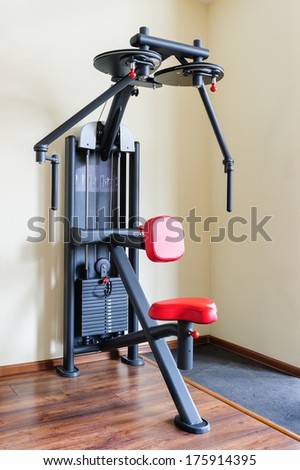 peck back gym machine for shoulders, pectoral, deltas and laterals workout