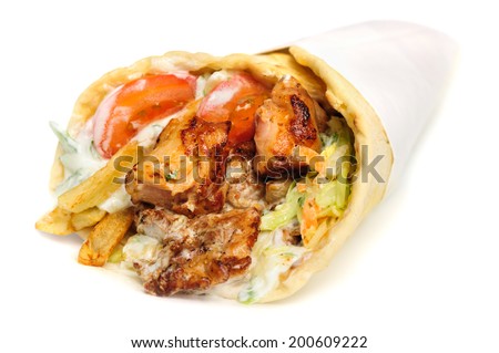 greek gyros stuffed with meat salad onion tomato and potato greek gyros stuffed with meat salad onion tomato and potato