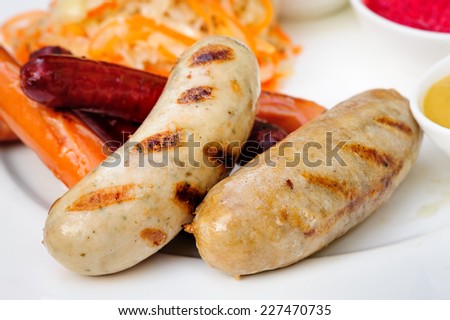 German sausage with cabbage and sauces
