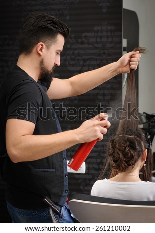 Professional hairdresser man at work