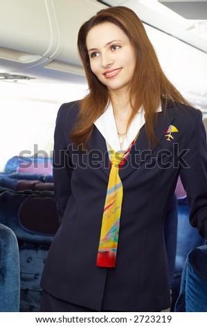 Air HOSTESS (Stewardess) In The Empty Airliner Cabin Stock Photo ...