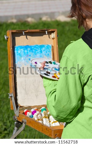 young artist working. selective focus.