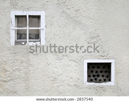 Wall surface with small closed street windows