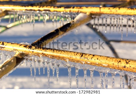Icicles on playground equipment after an ice storm.