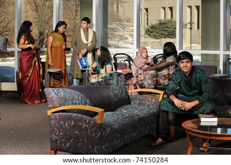 Group of Diverse College Students wearing their traditional attire in the University Campus