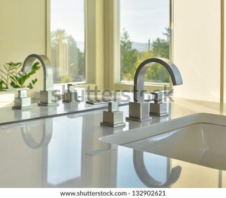 Sink And Reflection In Modern Bathroom