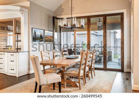 Dining Room with Entryway, Table, Elegant Light Fixture