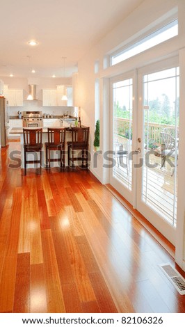 Beautiful Hardwood Floors, Doors, and Kitchen in Luxury Home