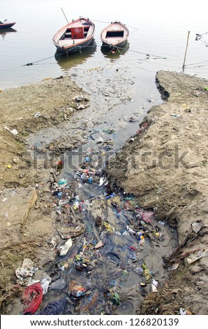 sewage water pollution channel to holy Ganges river In Varanasi, India