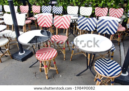 empty beautiful street cafe restaurant furniture in Paris - table and chair