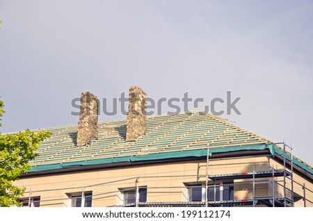 old urban house roof restoration repairing construction