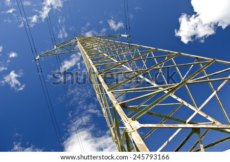 electricity high voltage metal pole construction and sky